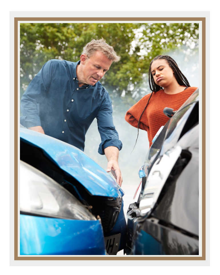 drivers inspecting vehicle damage after a car accident