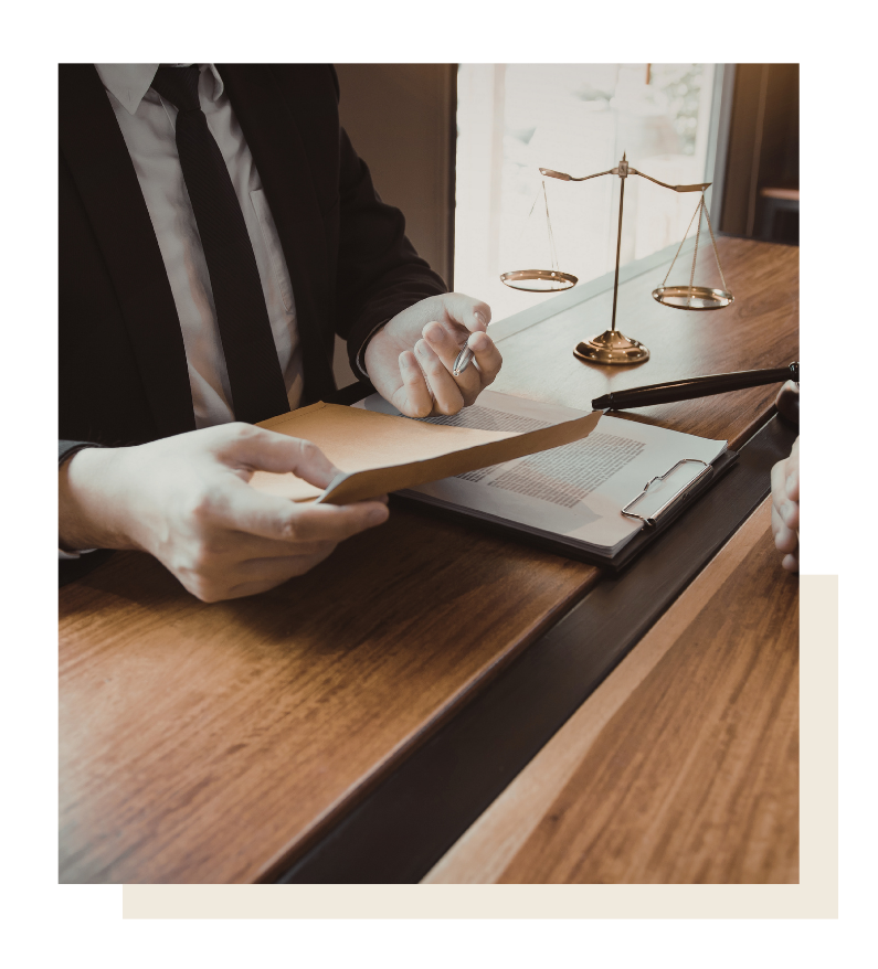 lawyer reviewing documents for will in Texas with client
