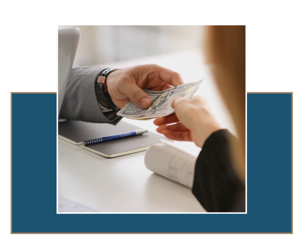 img8 » Ybarra Law Firm Cash payment being exchanged by hand